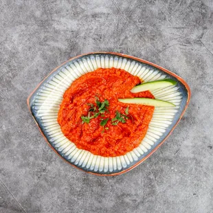 Ajvar
A rich and flavorful spread made from roasted red and green peppers, eggplant, and a hint of spice. Smooth, smoky and slightly tangy