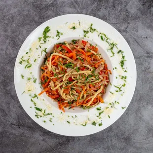 Primavera Pasta
A vibrant medley of al dente pasta tossed with sautéed carrots, onions, red peppers, tomatoes, and garlic