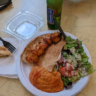 Grilled chicken kebab, spicy hummus, greek salad, baklava.