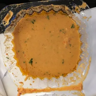 a bowl of soup and a plate of rice