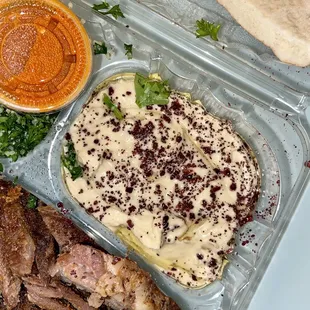 Hummus included in the dinner plates