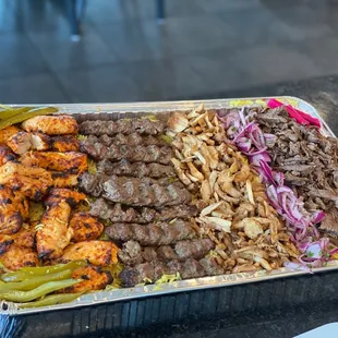 Combination of chicken skewers, beef kefta, chicken Shawrma and beef Shawrma!