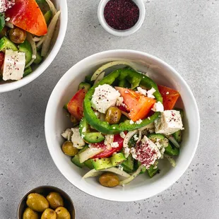 Greek Salad Tomato, Cucumber, Capsicum, Olives, Onions, Feta Cheese, Lemon Juice and Olive Oil.