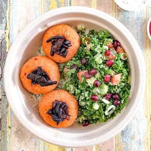 Red Lentil Balls Rice Bowl - Vegetarian. Comes with fresh herbs yogurt sauce and hot sauce