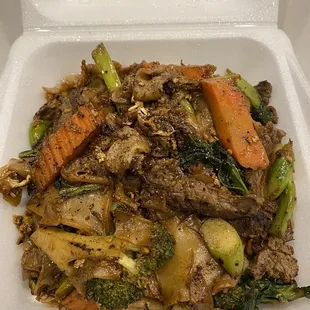 Pad See Ew (4 stars). Lots of tasty seasoning ontop so make sure to give it a good mix before digging in!