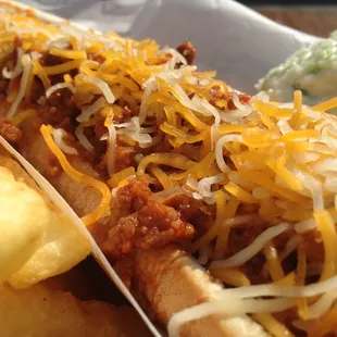 a chili dog and potato chips