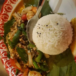 Pad Kra Gao special. Delicious, and don't let the three spice level deter you. I'd call it somewhere between mild and medium.