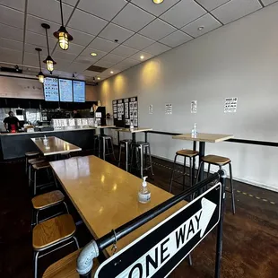 a long table and chairs in a restaurant