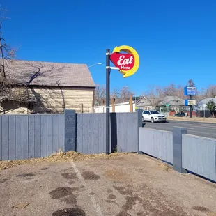 Sign on the street/edge of parking lot