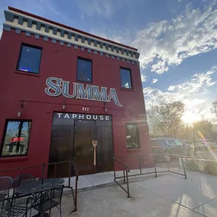The restaurant facade near sunset.