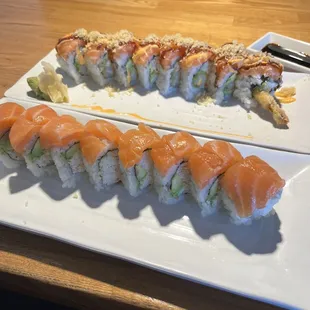 orange crunch roll on top, ultimate salmon roll on bottom