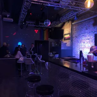 people sitting at the bar