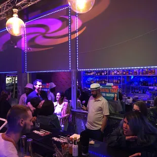 people sitting at the bar