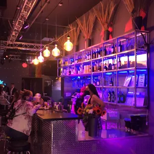 people sitting at the bar