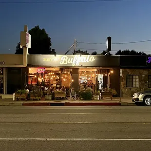 a car parked in front of a restaurant