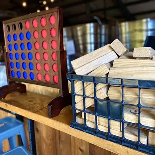 a blue crate with wooden pieces