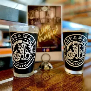 two pint glasses on a table
