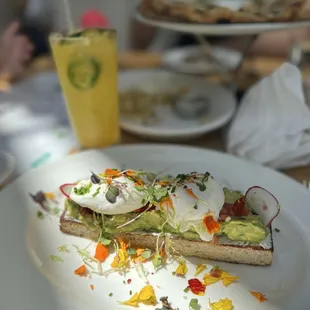 Avocado toast and pineapple mocktail.