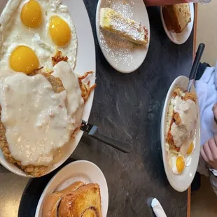 a breakfast of eggs, bread, and coffee