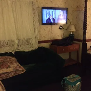 Filthy couch, scared to sit down, broken lamps, curtain rods sagging, cables attached to the middle of walls