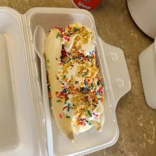 a banana split with sprinkles