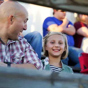 All smiles in the stands.