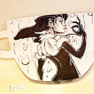 a drawing of a woman holding a cup of coffee