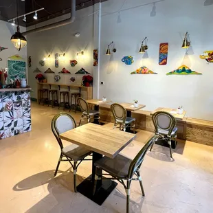 tables and chairs in a coffee shop