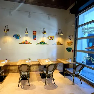 tables and chairs in a coffee shop