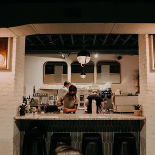 two people working at a counter