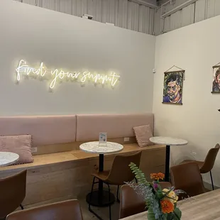 a table and chairs in a coffee shop