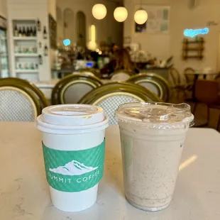 two cups of coffee on a table