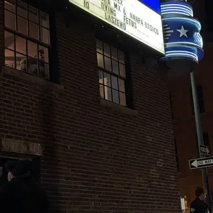  theater marquee lit up at night
