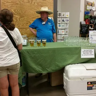 Beer mugs and wine mugs while donating to the fire department