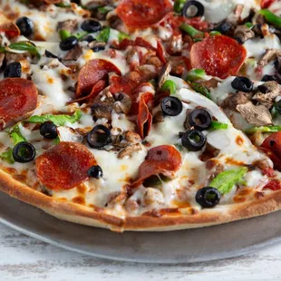Hand Tossed Supreme Pizza - dough tossed fresh daily in house