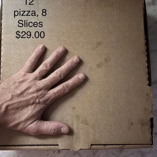 12 inch (medium pizza). $29.00  16 oz beer. $7.75