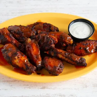 Buffalo Wings (baked not fried) made in House with our special recipe.