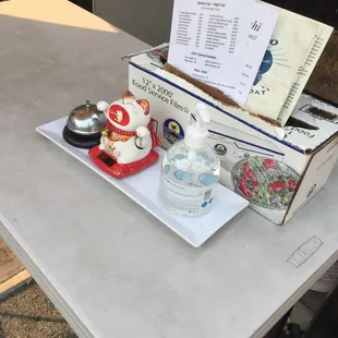 Back of restaurant parking lot to-go pick up station.