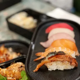 a variety of sushi dishes