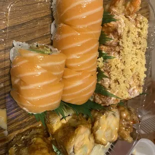 Flaming Amy, Salmon Yaki, and Double Sake rolls to go