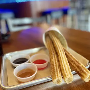 Churros with dipping sauces