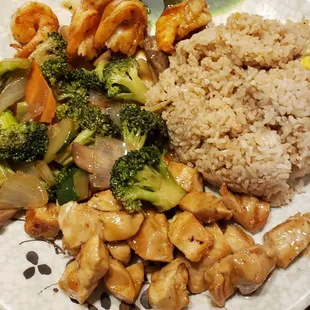 Sushi, steak &amp; shrimp hibachi, and soup with shrimp, noodles, onions, mushrooms, carrots with an egg on top