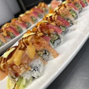 sushi on a long white plate