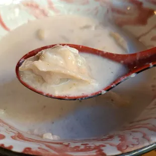 Close-up of Banshtai Tsai, Mongolian beef dumplings (bansh) served in milk tea.
