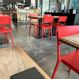 tables and chairs in a coffee shop