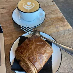 Chocolate croissant and cappuccino