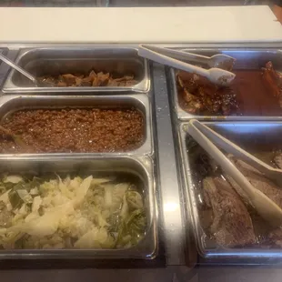 Ribs, brisket, sweet potatoes, beans, and cabbage