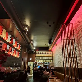 Dining area with wine or sake on wall