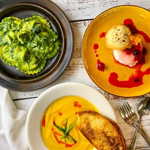 Pesto ravioli, Curried butternut squash soup, buttermilk panna cotta with a cranberry coulis