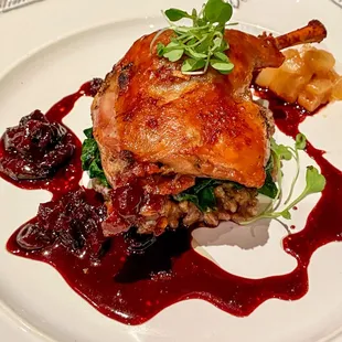 Duck confit with a farro risotto &amp; a cherry duck demi glace